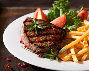 Rustic grilled beefsteak with french fries