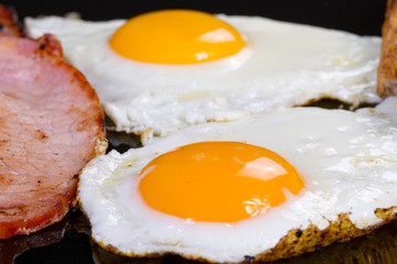 Irish breakfast with two eggs, bacon and toast