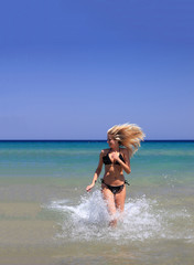 Fototapeta premium Attractive girl on the beach
