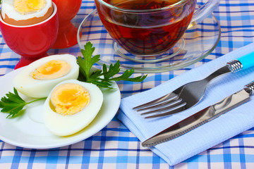 delicious breakfast of boiled eggs and tea