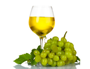 Ripe grapes and wine glass isolated on white