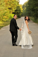 Naklejka premium beauty, couple, lifestyle, walking, wedding, young