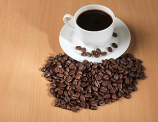 Coffee beans and cup