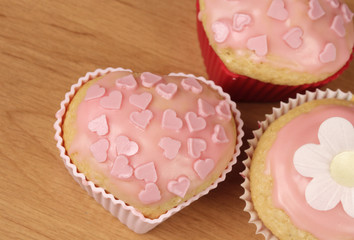 Obraz na płótnie Canvas Heart shaped cupcakes