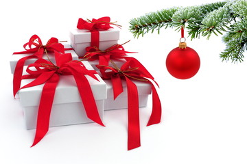 Christmas tree over  gift with red ribbon