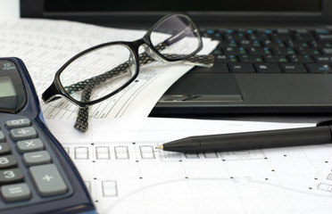 Drawings, pen and glasses