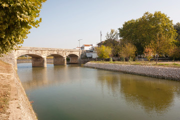 Fototapeta na wymiar Old Bridge over river