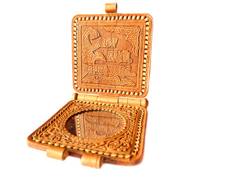 mirror made from birch bark on a white background