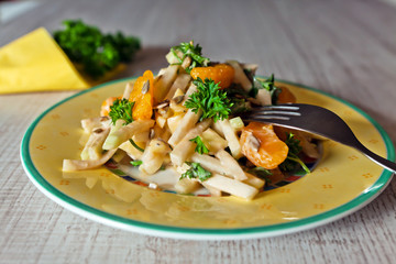 Kohlrabi salad on white wooden table