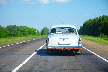 Vintage car on a countryside road