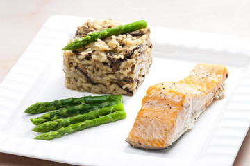 baked salmon with mushroom risotto and green asparagus