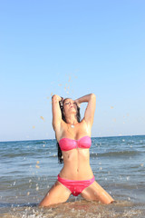 Obraz premium Attractive girl on the beach