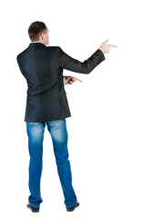 young expert looks ahead. rear view.