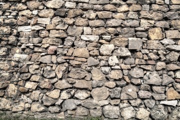 Stonewall of medieval castle.