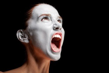 Mime girl looks up and screams. - obrazy, fototapety, plakaty