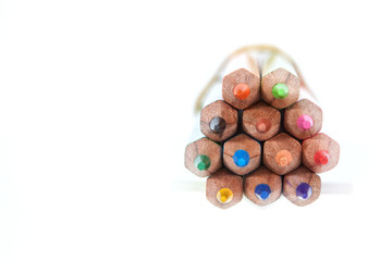 Colored pencils in a bunch of close-up