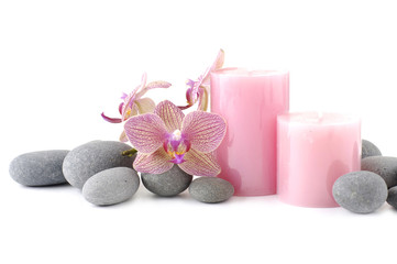 Spa concept white orchid, candle ,pebble