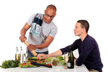 Mixed ethnicity  gay couple kitchen