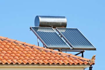 Solar panel on a red roof