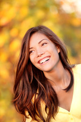 Fall woman smiling - Autumn portrait