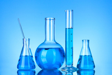 Test-tubes on blue background