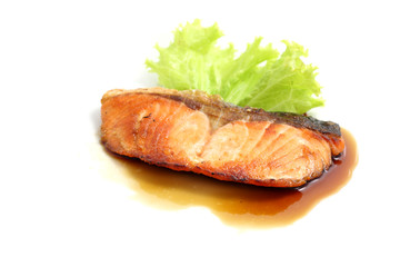 grilled salmon with teriyaki sauce isolated in white background