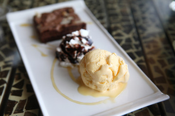 Cake with ice cream and cream