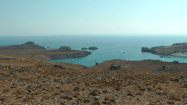 Yact in the Lindos bay. Rhodes island. Greece.