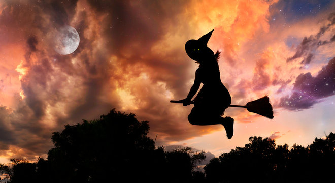 Flying witch on broomstick