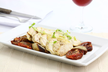 Chicken salad with wine in white background