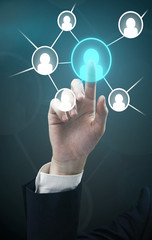 Man hand pressing Social Network icon