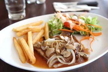 Grilled Porkchop with Potatoes and salad