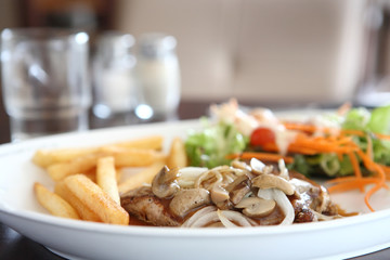 Grilled Porkchop with Potatoes and salad