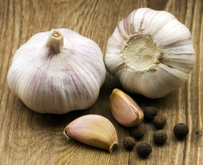 garlic on rough chopping board.