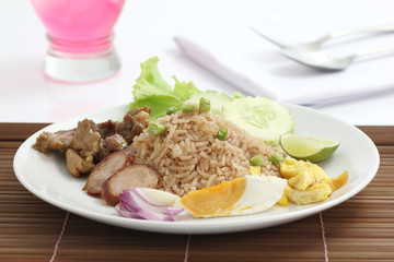 Thai food rice mixes the shrimp paste isolated in white backgrou