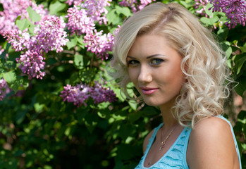 Young blonde woman in the park