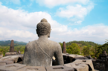 Stone Buddha and Borobudur Temple