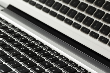 Laptop keyboard and reflection close up