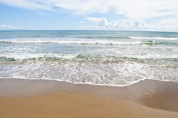 Empty tropical beach and clear blue sky