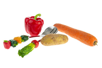Various vegetables and funny spoons