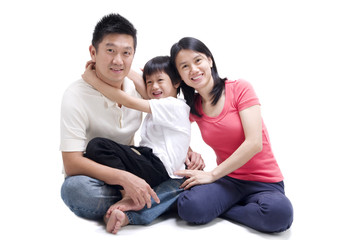 Asian family sitting on the floor
