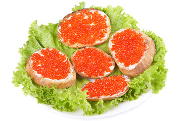 Sandwiches with red caviar on white background