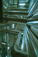 Obraz premium Industrial zone, Steel pipelines in blue tones