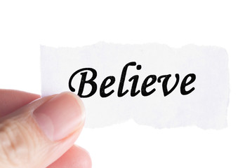 Believe word in finger © Anson
