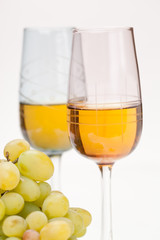 Still-life with bunch of grapes and white wine