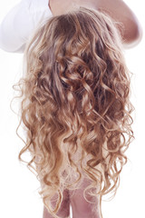 Naklejka premium Blond curl hair of young woman