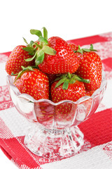 Ripe fresh strawberry in glass bowl on desert