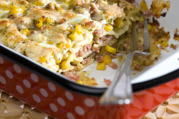 pasta baked with smoked meat and corn