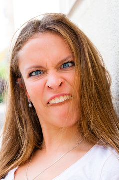 expression-Young woman making a funny grimace