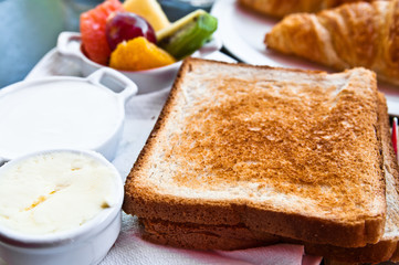 Breakfast with orange juice and fresh fruits